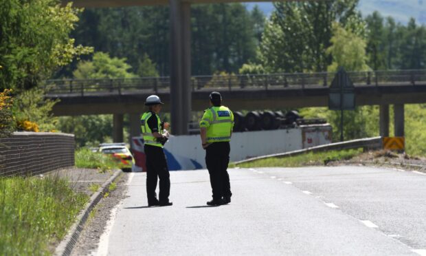 Police on the A912 near Perth after a lorry crash.