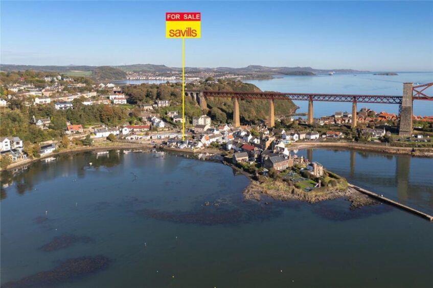 The home sits below the Forth Rail Bridge