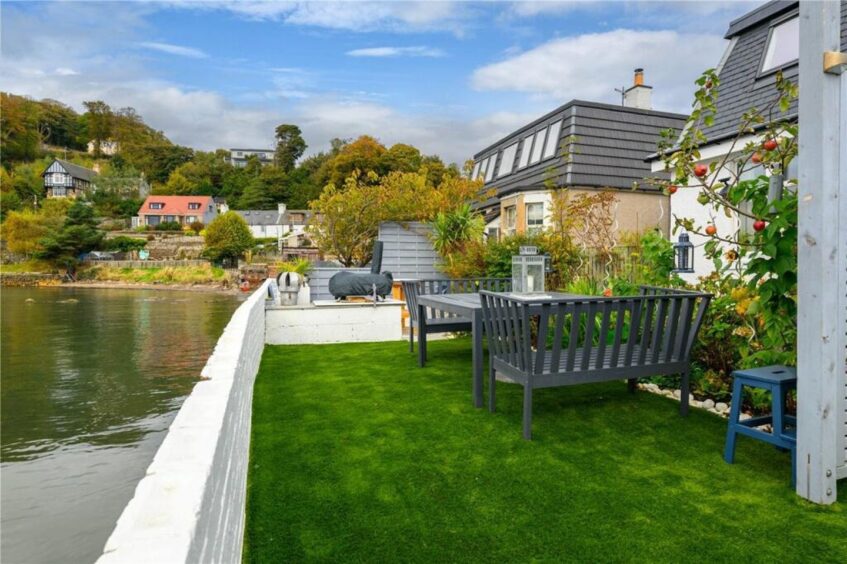 The front garden overlooks the Firth of Forth