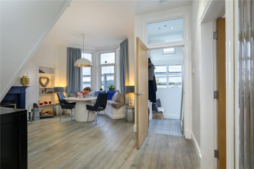The entrance leads to the sitting room