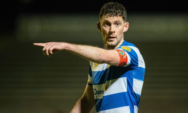 Jack Baird issues an order on the pitch.