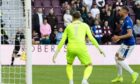 Barry Douglas puts the ball into his own net at Hearts.