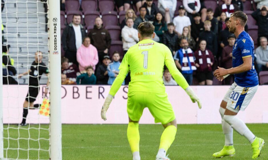 Barry Douglas puts the ball into his own net at Hearts.