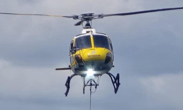 The helicopter being used to fight the fire. Image:  Dylan Mckinnon