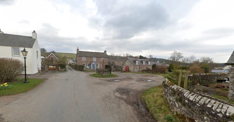 Fowlis Wester, a small collection of traditional houses around a church and village square with Pictish stone in centre
