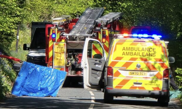 Emergency services at the scene of the crash on the A827 near Kenmore. Image: Robin Baker