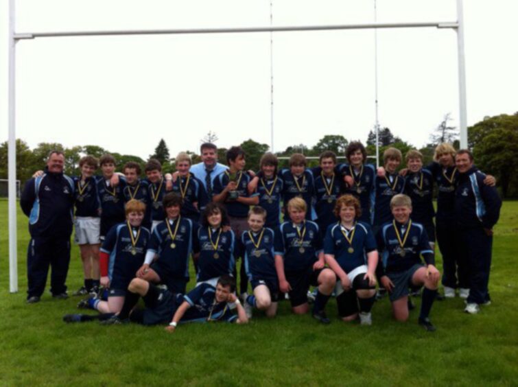 The Blues squad pose for a picture under the goals
