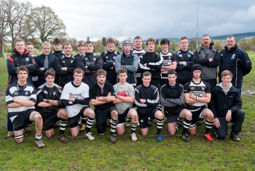 Players and staff of the Perthshire U/18 Colts squad line up for a picture
