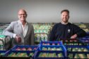 John Kelvin Kerr Snr and John Kelvin Kerr Jnr at their Dundee depot. Image: Mhairi Edwards/DC Thomson