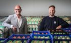 John Kelvin Kerr Snr and John Kelvin Kerr Jnr at their Dundee depot. Image: Mhairi Edwards/DC Thomson