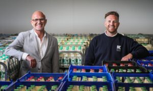 John Kelvin Kerr Snr and John Kelvin Kerr Jnr at their Dundee depot. Image: Mhairi Edwards/DC Thomson