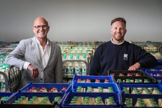 John Kelvin Kerr Snr and John Kelvin Kerr Jnr at their Dundee depot. Image: Mhairi Edwards/DC Thomson