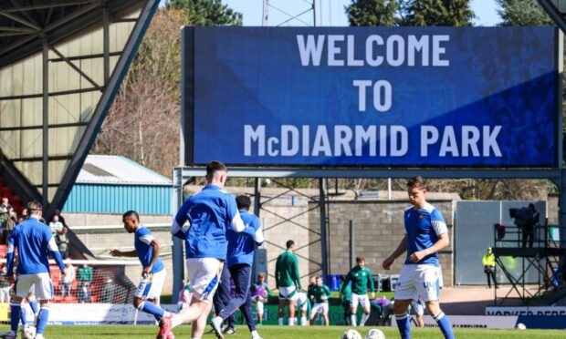 St Johnstone players warming up before a home game against Celtic.
