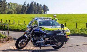 Police at the scene of the crash. Image: Bill Nicoll