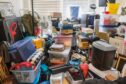 boxes-stacked-in-a-room-hoarding