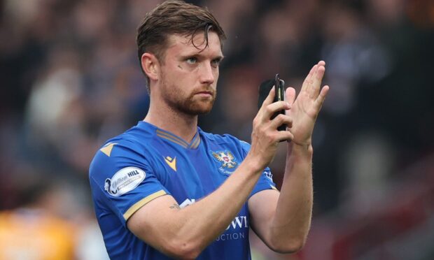 Elliot Watt applauds the St Johnstone fans after the defeat to Motherwell.