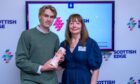Agritech entrepreneur Tom Porter, of Carnoustie, is presented with his latest Scottish Edge award by Marjory Sweeney, of Scottish Enterprise. Image: Tom Porter
