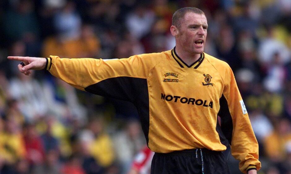 Graham Coughlan points out some instructions during his time as a player with Livingston.
