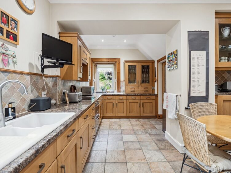 There is extensive cabinetry in the Tigh-na-Traigh kitchen.