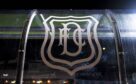 Dundee FC badge on Dens Park dugout