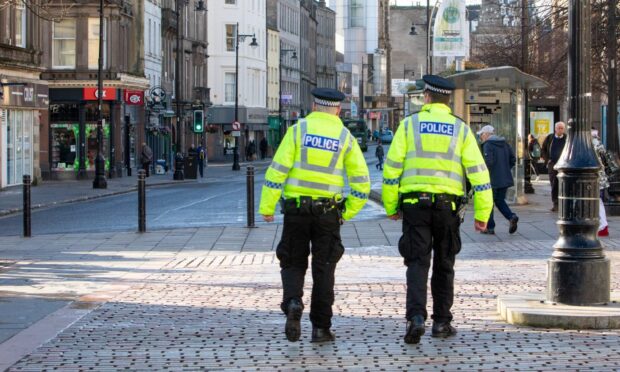 Police in Dundee city centre.