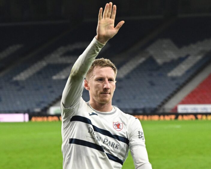 Liam Dick waves to the Raith Rovers supporters.