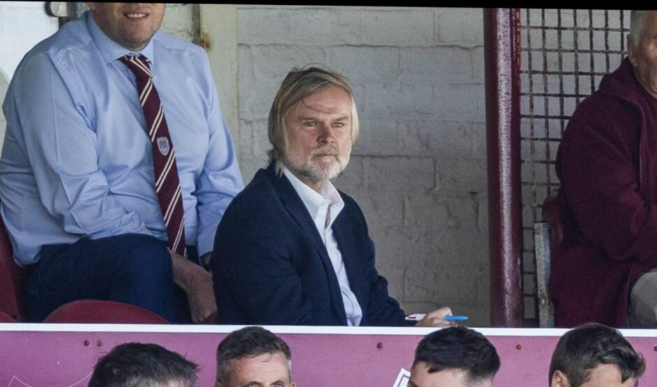 Steven Pressley watches on from the stands as Dundee beat Arbroath. Image: Ross Parker/SNS