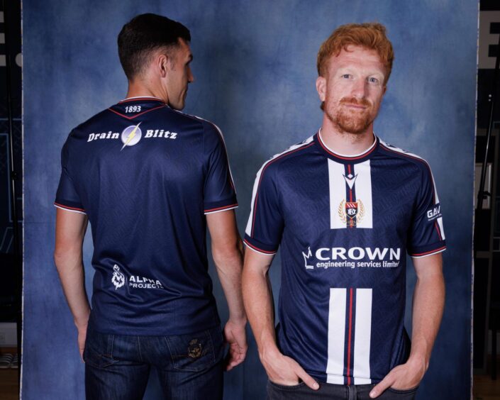 Club captain Simon Murray is joined by new signing Paul Digby to show off the home top. Image: David Young