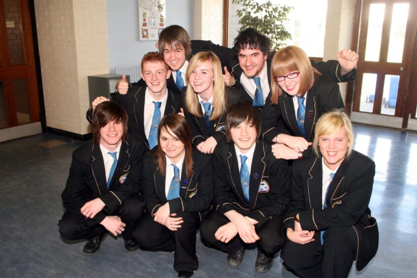 Pupils in school uniform celebrate the good report for Braeview Academy 