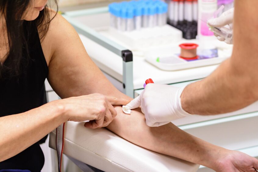 A patient undergoing a blood test. 