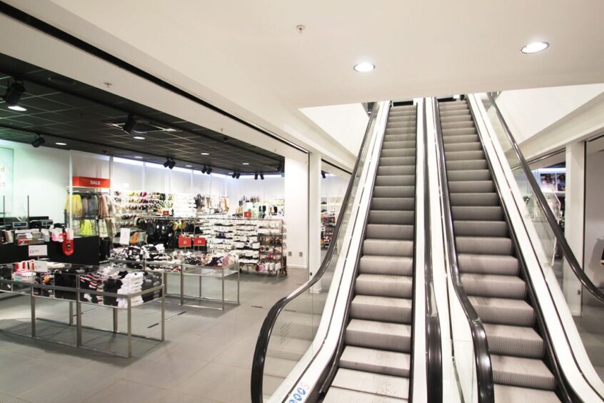 An escalator provides access between floors at the former H&M Stirling shop