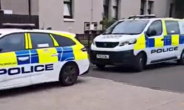 Police on Derby Street, Dundee, following the "disturbance". Image: Supplied