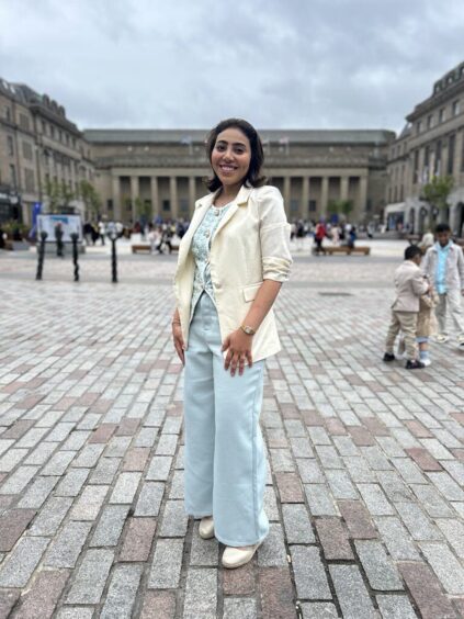 Radhda Aljehar put on her best to celebrate her sister’s graduation today.