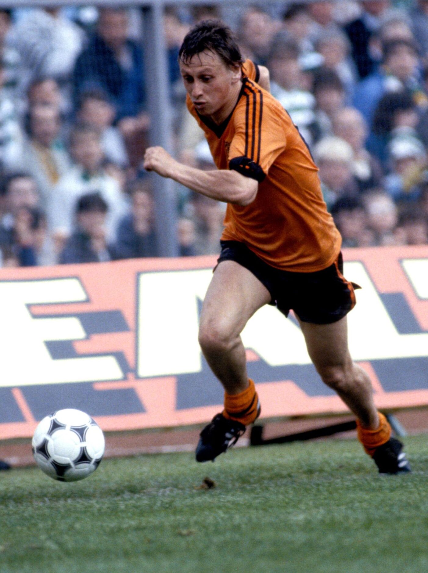 Fans look on as Paul Sturrock runs down the wing in the 1985 Scottish Cup final.