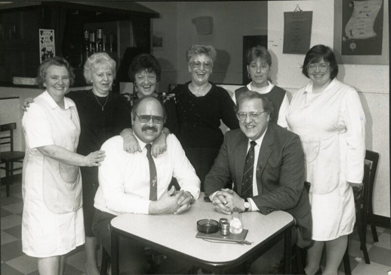 Lawrence and Raymond Sterpaio with staff in 1989.