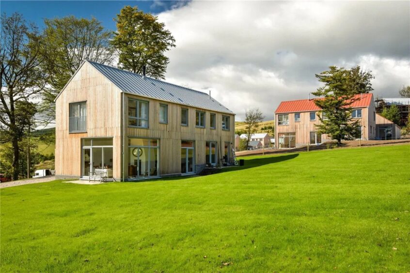 An artist's impression of homes at Milnathort housing development Athron Hill. 