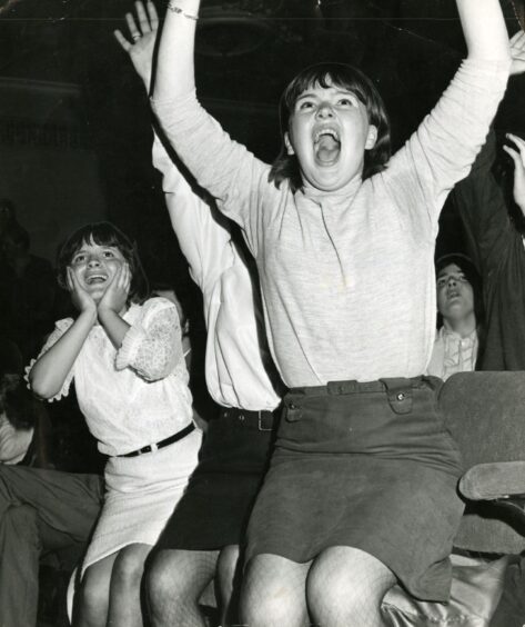 Stones fans go wild when the band take to the stage. 