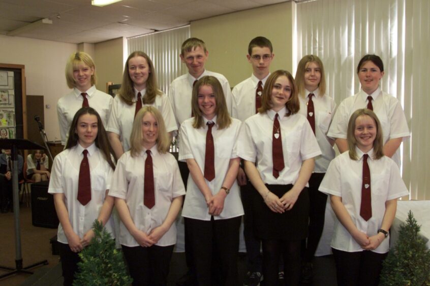 Braeview Academy senior prize-winners in school uniform line up for a picture