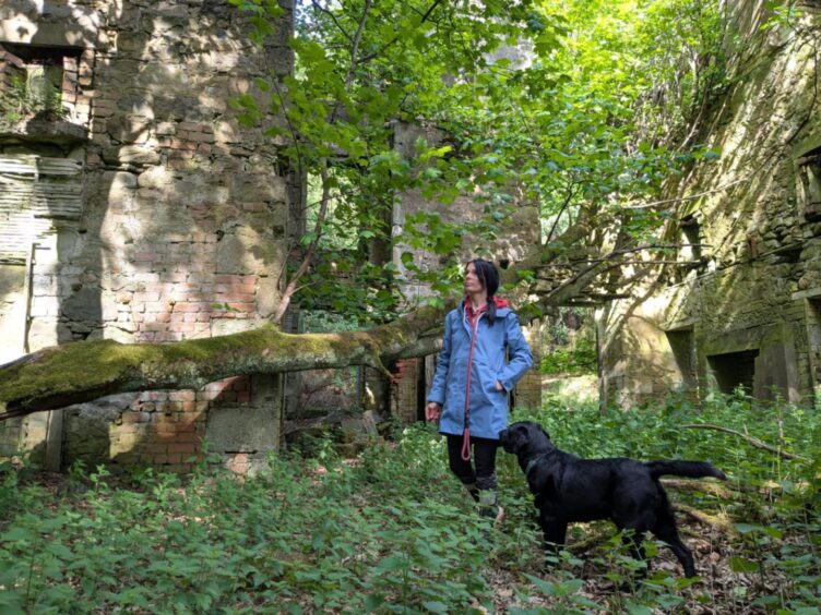 Gayle and her Labrador Dante explore Bellaty Lodge.