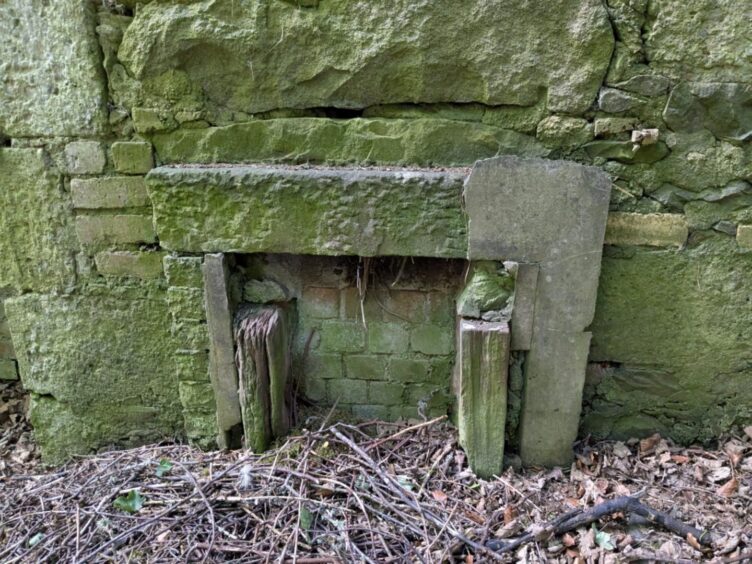 Old fireplace in Bellaty Lodge