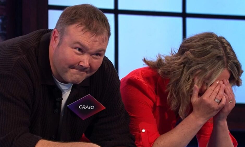 Contestant Craig Smith looks on as wife, Lyndsey cant look on Bridge of Lies BBC quiz show.