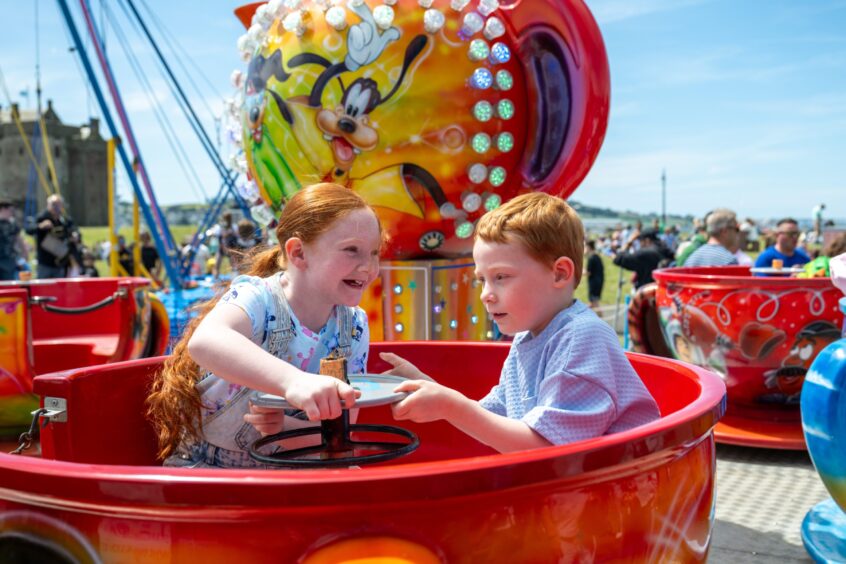 Pixie and Luca enjoying the rides.