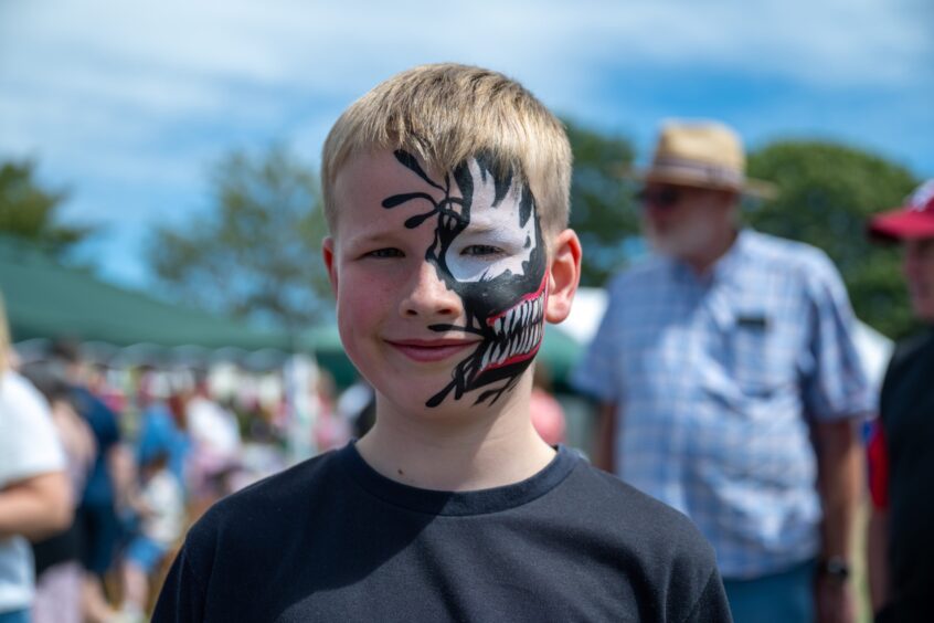 Alistair Marwick, age 9, with his face painted.
