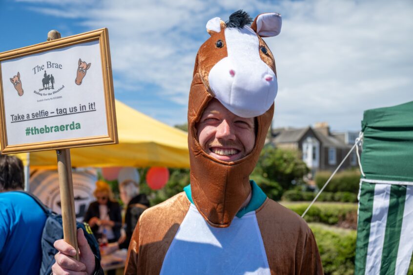 Horsing around in the sun on the first day of Broughty Ferry Gala Week.