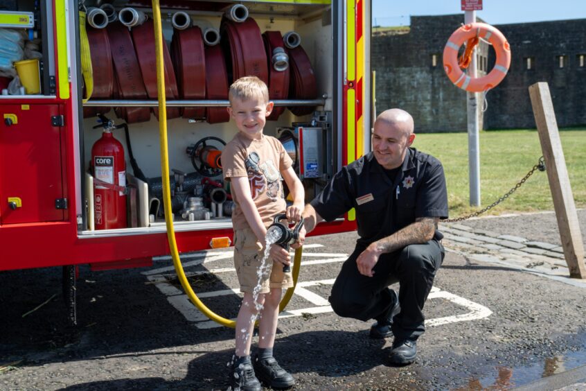 Torben Bruce with a fire hose during the Broughty Ferry Gala Summer Festival.