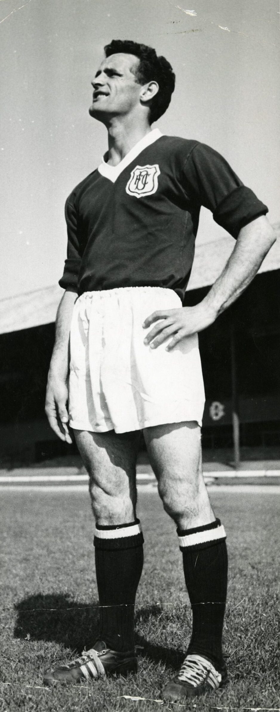 Bobby Cox in Dundee FC kit on the pitch at Dens Park