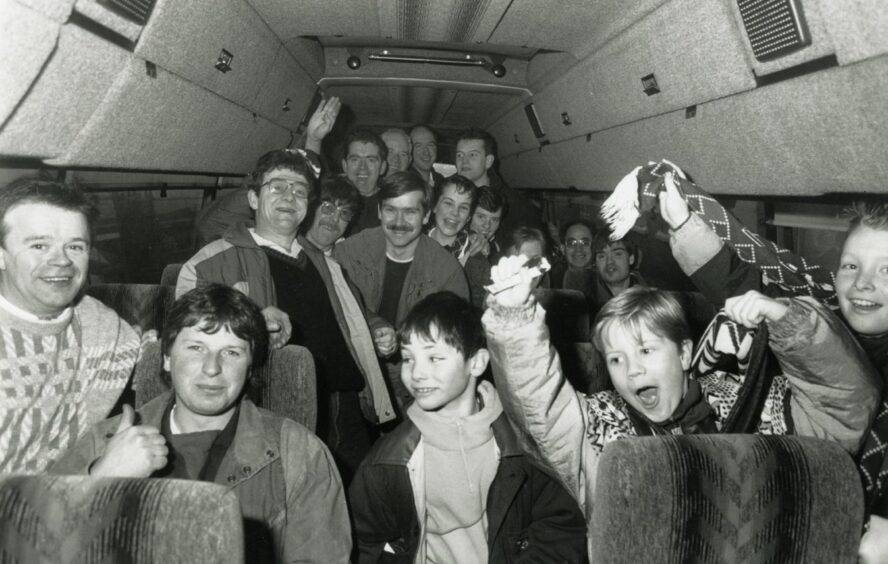 Dundee fans bound for St Mirren in free buses.