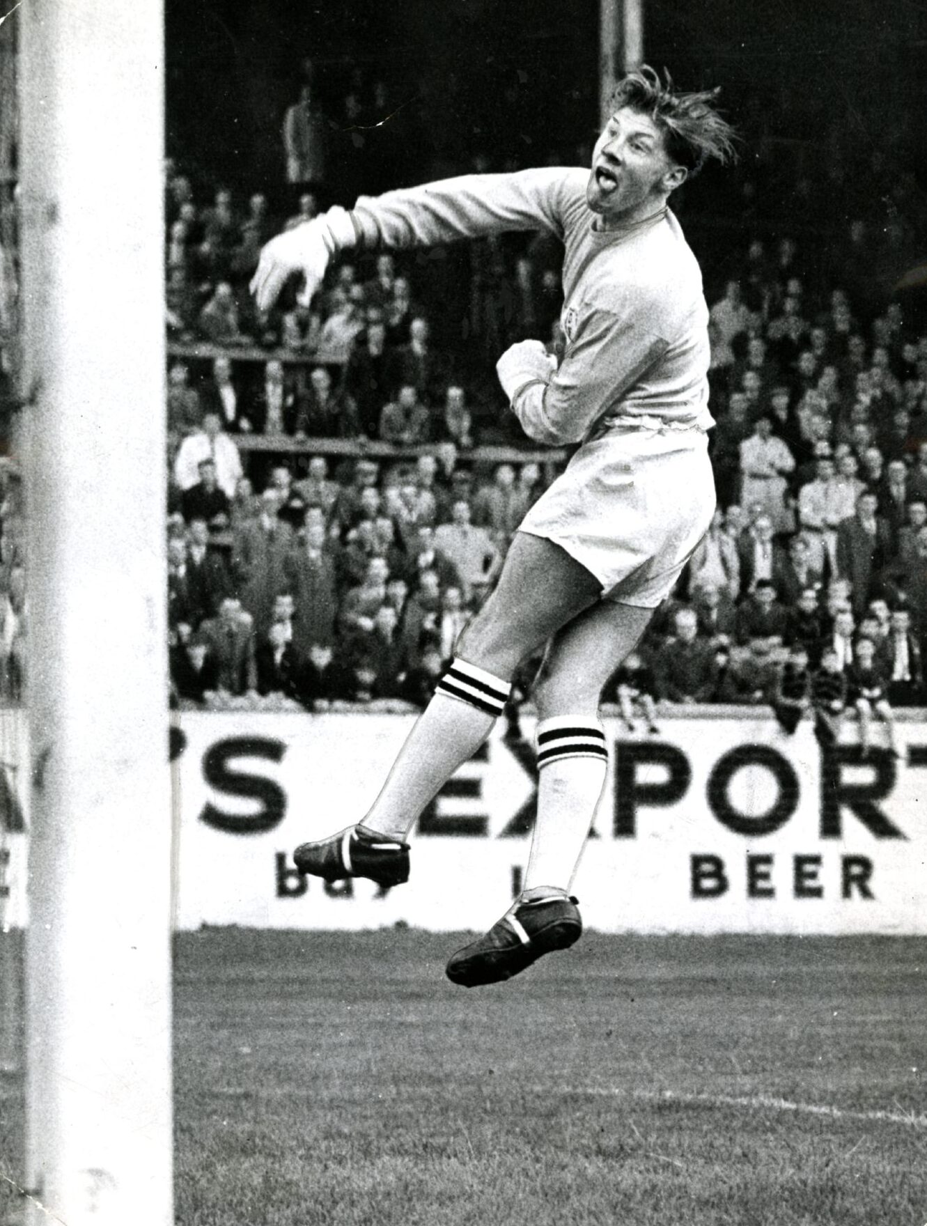 Dundee United goalie MacKay leaps in the air against St Mirren at Tannadice in August 1963