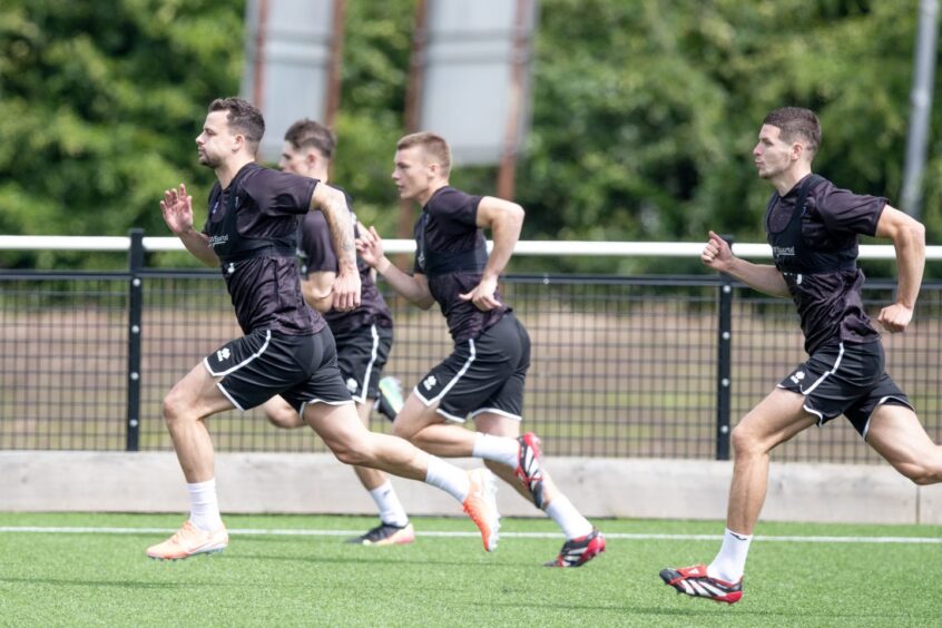 Pars players run hard during training.