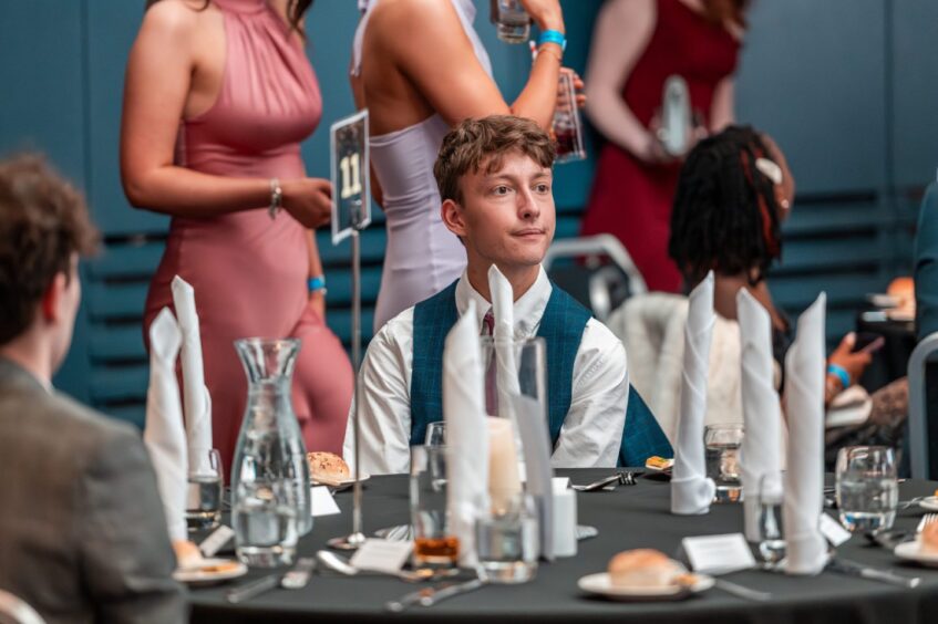 Guests sit at the table at Apex Dundee